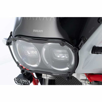 Protection de phare amovible Clear Wunderlich pour Ducati DesertX. Blackpines.fr